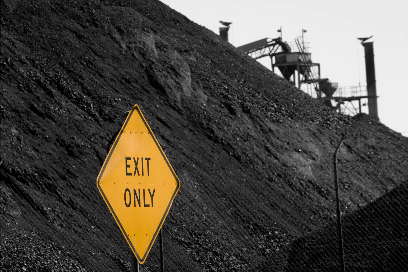 Exit Only sign located in front of a fossil fuel producing mine