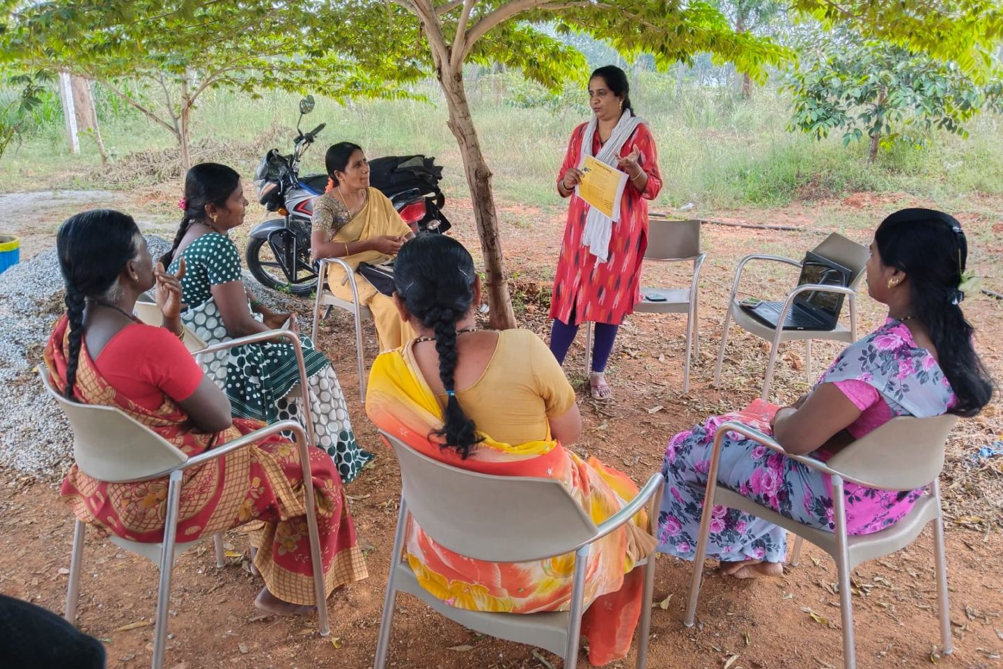 Group of women in India or Nepal learning new business skills with Pollinate Group